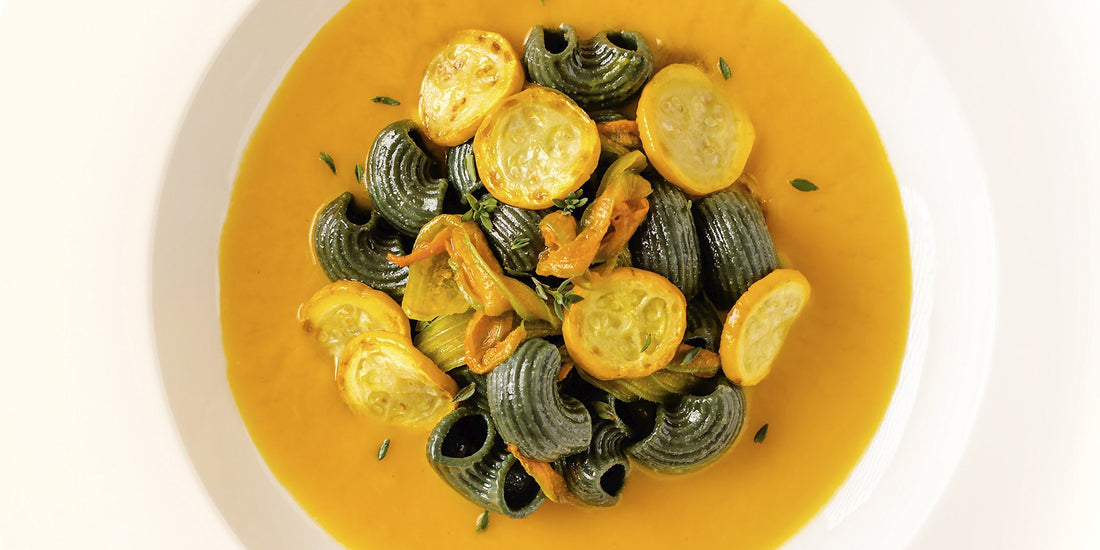 White Corn and Spirulina Pipe Rigate with Summer Squash and Squash Blossoms